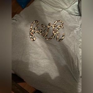 Faith shirt fits like a Xl!